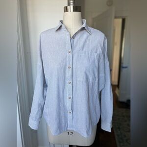 Stripe button down shirt with dolman sleeves.